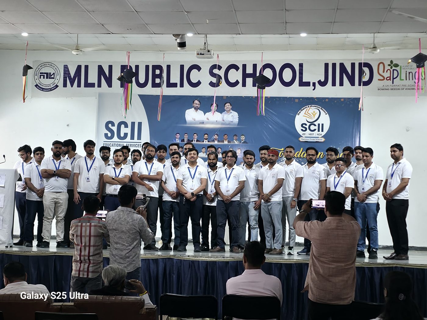 The SCII team on stage at MLN Public School, Jind